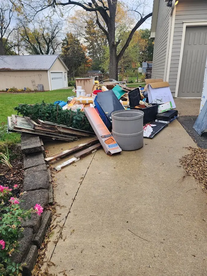 Dumpster being loaded with debris for Residential Dumpster Rental in Santa Barbara
